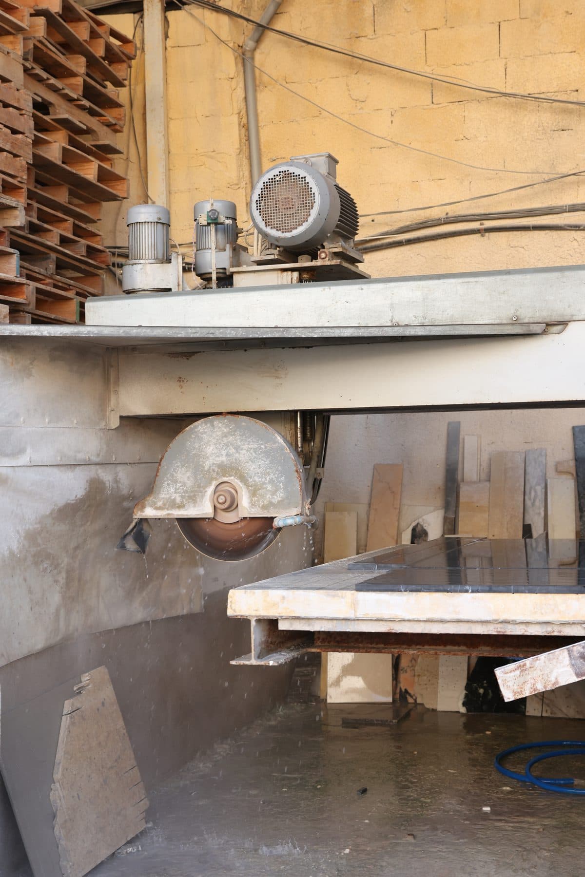 The bridge saw cutting a stone slab at the Zein Group workshop, Beirut