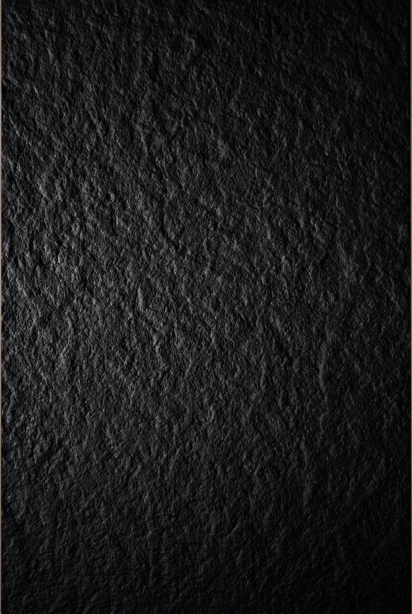 Absolute Black flamed granite with a deep, matte, textured finish